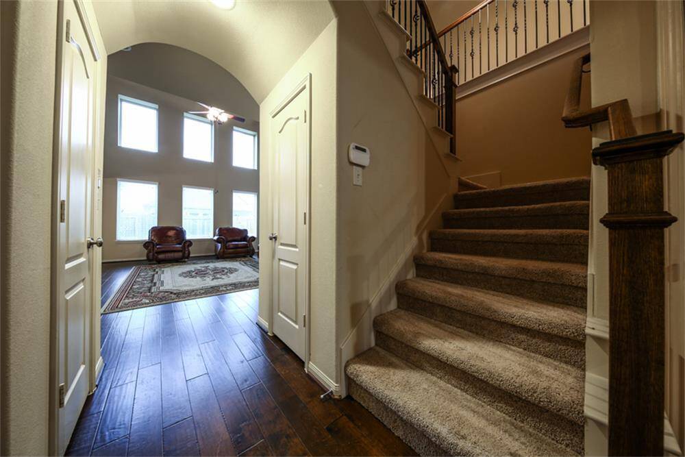 Take the elegant sweeping iron staircase to the second floor and discover even more living space and thoughtful upgrades throughout.