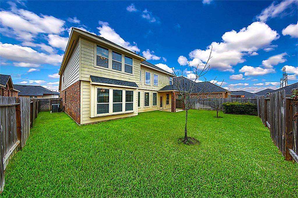 Expansive backyard—ideal for a playground, outdoor fun, and more!