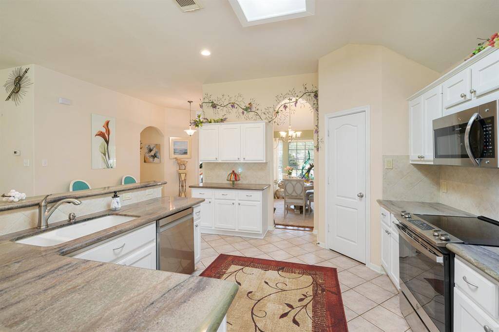The kitchen is spacious and has granite countertops.