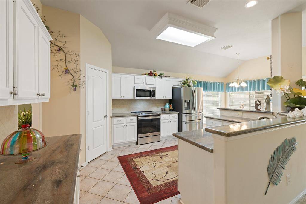 The kitchen also includes a walk-in pantry.