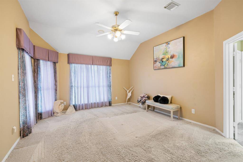 The primary bedroom has room for your king bed and large dressers.