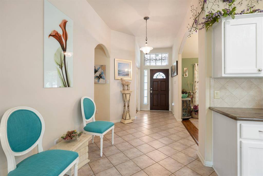 High ceilings and lovely fixtures throughout the home.