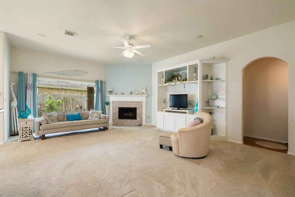 Huge picture window in the den gives you a wonderful view of the private backyard.