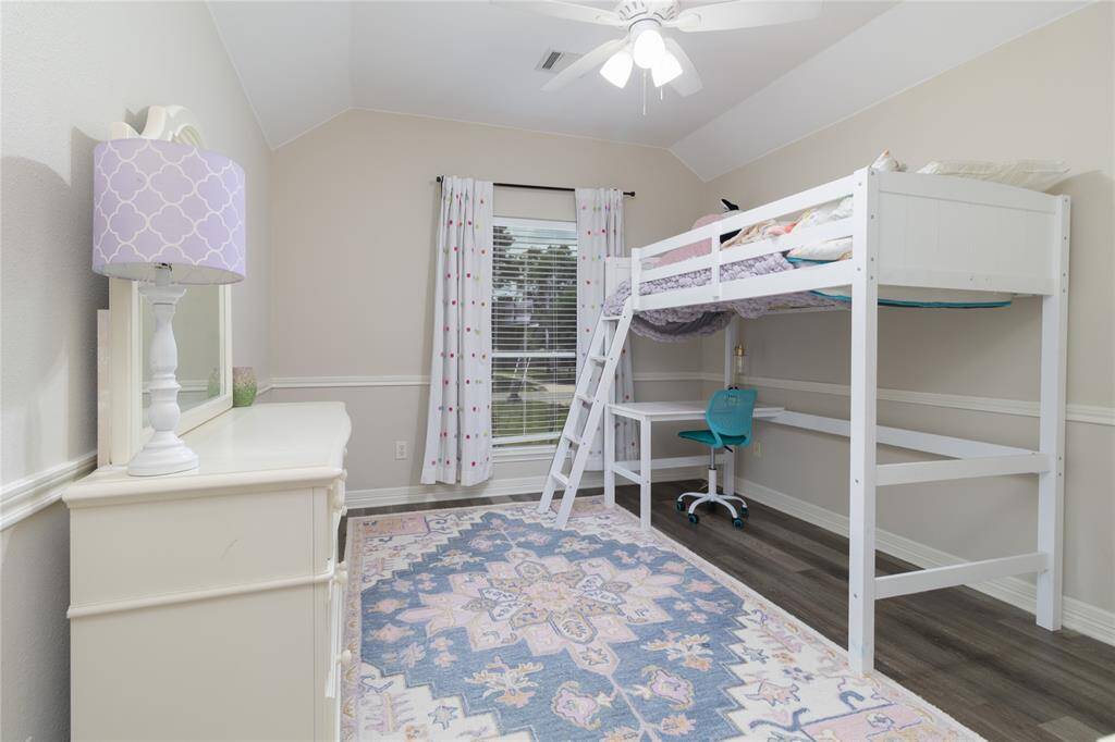 Bedroom #1 with ceilings high enough to accommodate bunk beds.