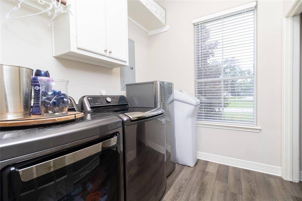 Spacious laundry with room for  extra food storage and an additional pantry space