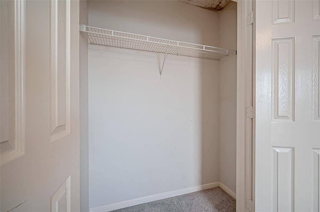 The built-in closet in the bedroom maximizes storage efficiency.