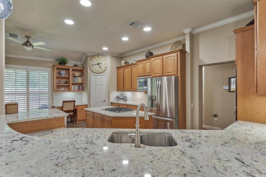 This granite was installed recently, alongside the tile backsplash.