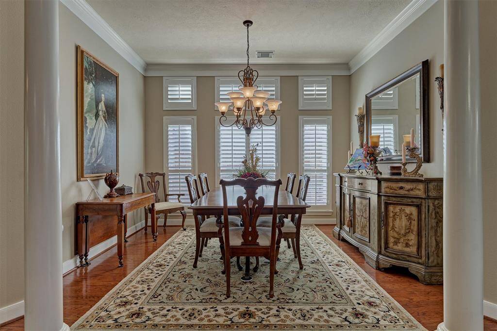 The dining room can accommodate all of your finest furniture pieces.