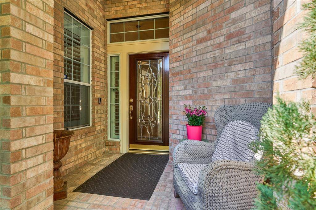 The covered porch will great your guests in style and keep your deliveries dry.