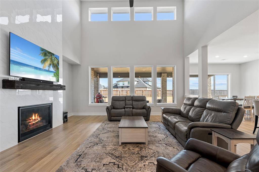 High Ceilings, windows galore and a spacious family room await your family and guests!