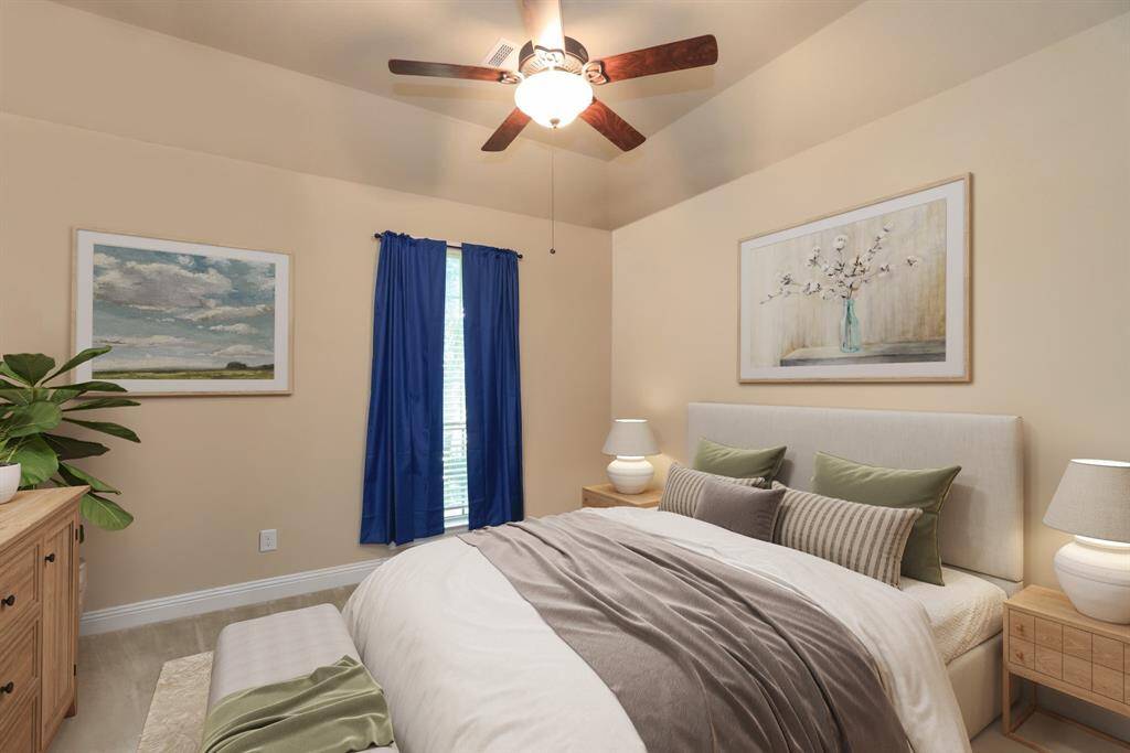 First floor bedroom with window and full closet