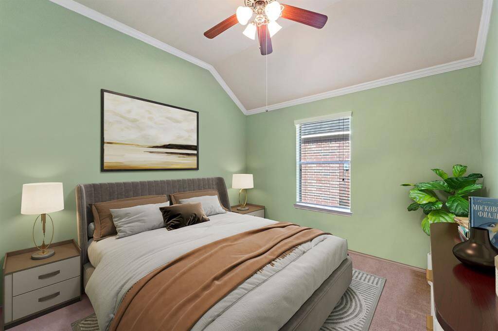 This charming bedroom features custom paint, soft carpet flooring, a window with privacy blinds for added comfort, and a ceiling fan to keep things cool and breezy. *Virtually Staged*