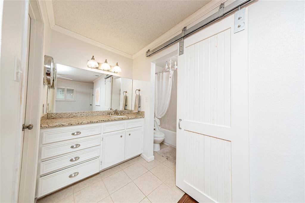 Slide the barn door closed for privacy to your shower and toilet area.