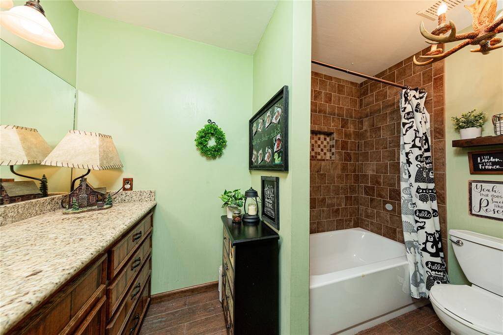 The secondary bathroom is situated in the hall and shared between the two secondary bedrooms.