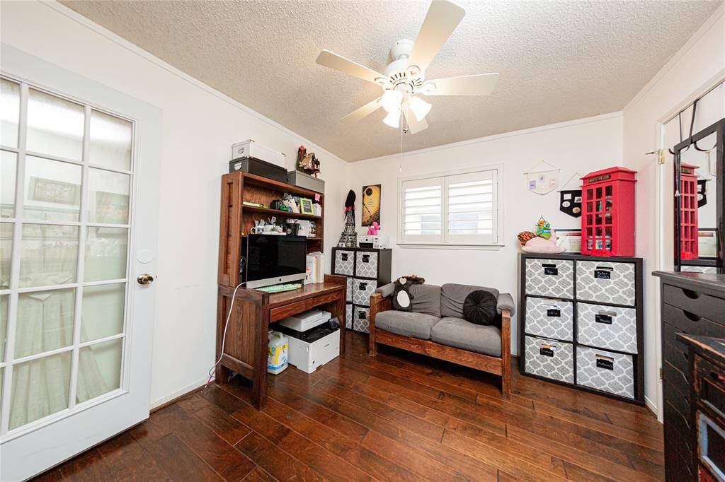A large closet also accompanies this room along with plantation shutters.