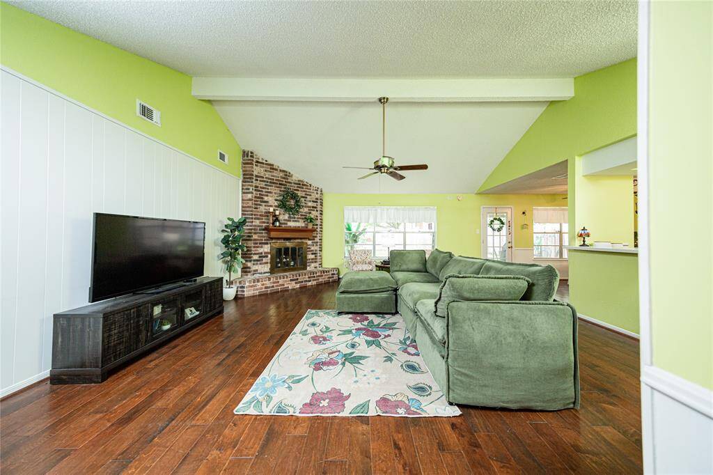 Inside you are greeted by beautiful wood floors throughout the home.