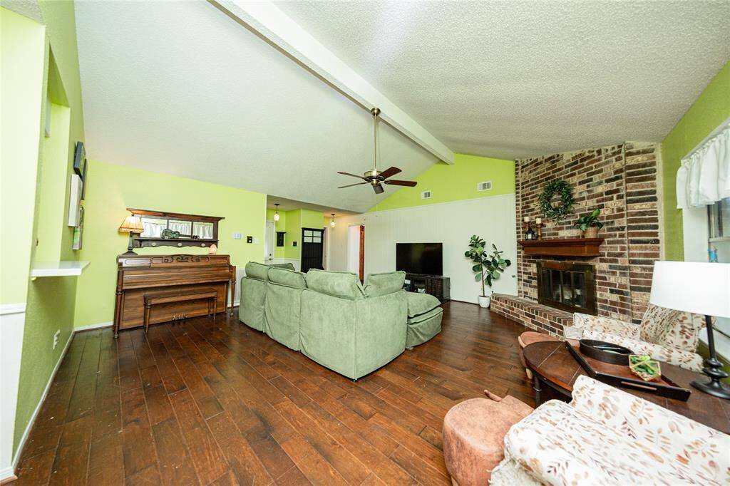 This living space has enough room for two different sitting areas if you wish or larger furniture.