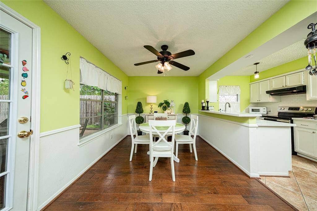 View into the breakfast room and kitchen area.