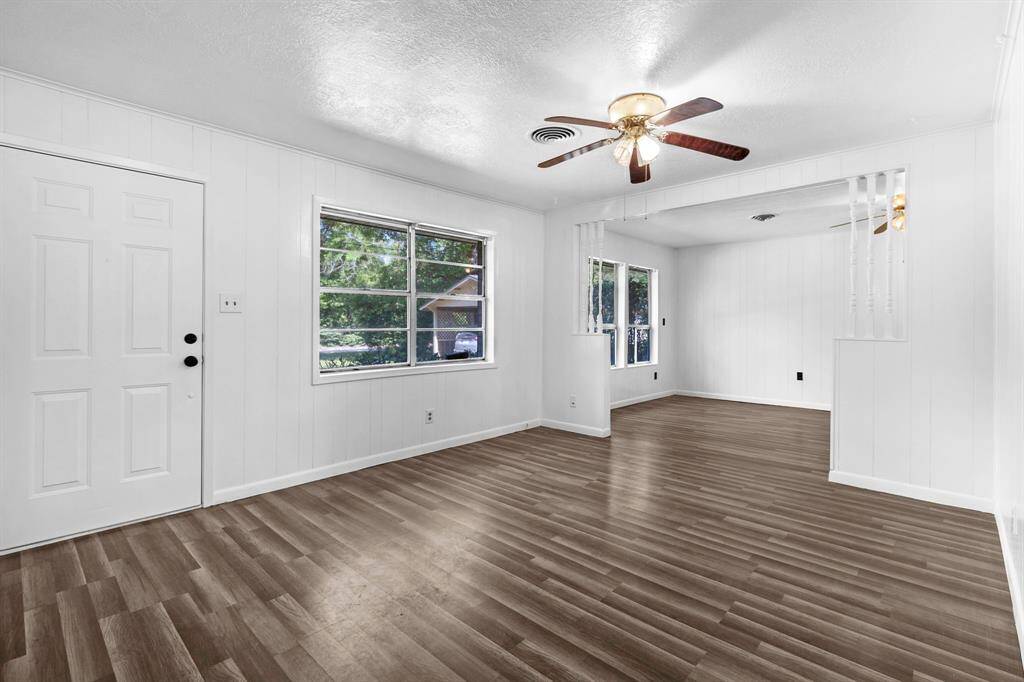 Plenty of open living room space.  Can create a nice seating area, game room or dining room!  So much room that allows you to host and entertain!