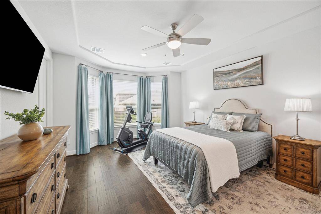 Spacious Primary Suite with bay window allowing lots of natural light. Spacious enough for your furniture needs and sizes.