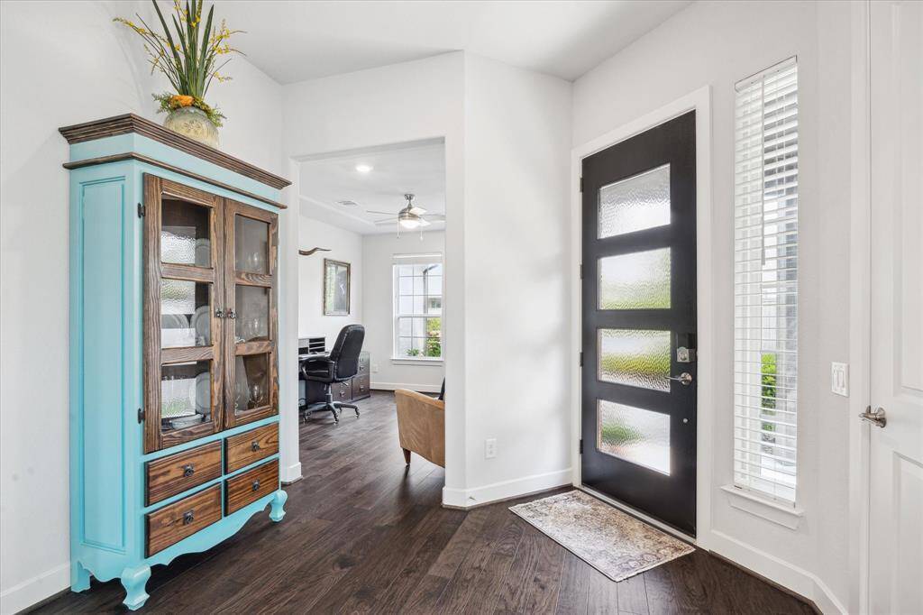 Foyer with space for that special piece of entry furniture and nice coat closet.