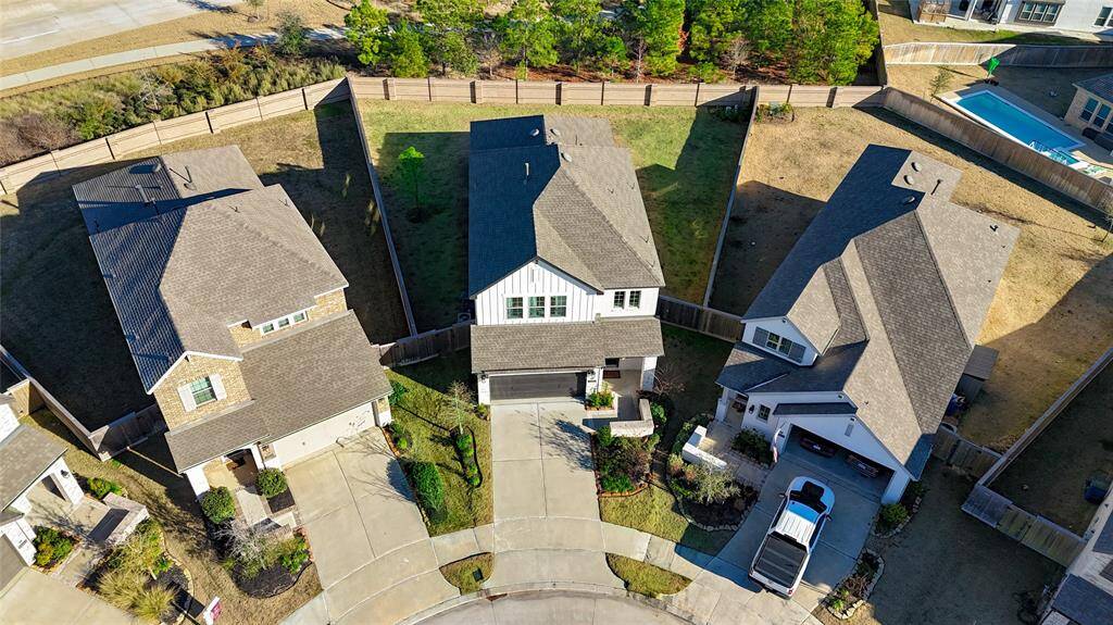This aerial view captures the privacy of this Cul-de-Sac location with no neighbors behind.