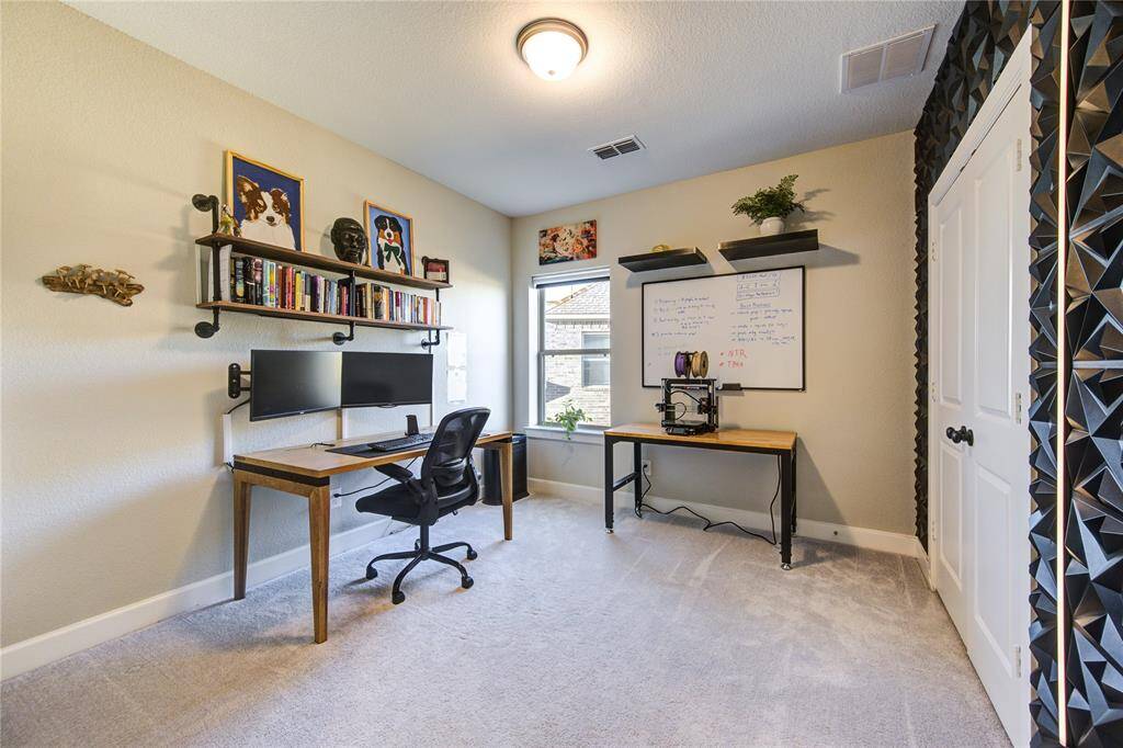 Both bedrooms feature neutral-toned walls, ceiling fans, and generous closet space, providing functionality and comfort. These well-appointed rooms are perfect for family members, guests, or even a home office.