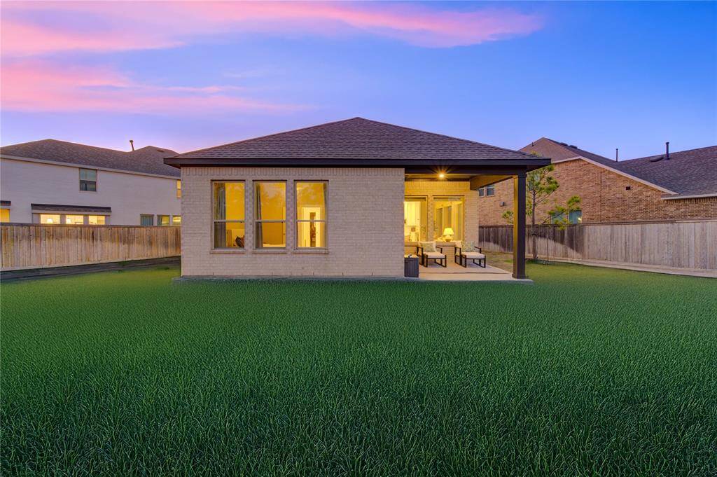 The well-maintained lawn offers plenty of room for a playset, garden, or future outdoor upgrades. With no back neighbors (if applicable) and ample space for entertaining, this outdoor retreat is ideal for creating lasting memories with family and friends.