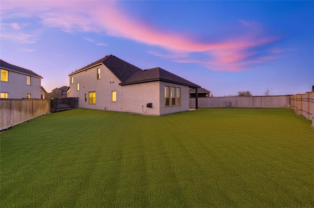 Situated on a cul-de-sac lot with a lush green space directly behind, this home offers unmatched backyard privacy with no rear neighbors looking in—perfect for peaceful outdoor living.