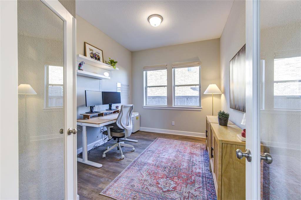 A private first floor study with French doors provides a dedicated workspace with plenty of natural light.