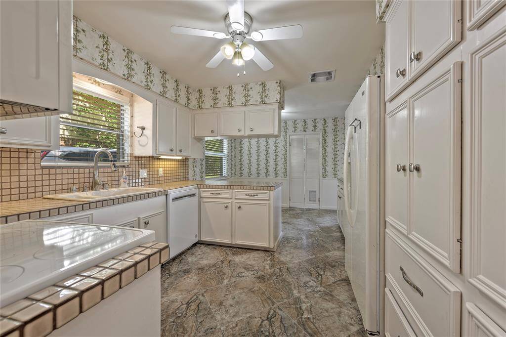 Kitchen with beautifully done cabinets