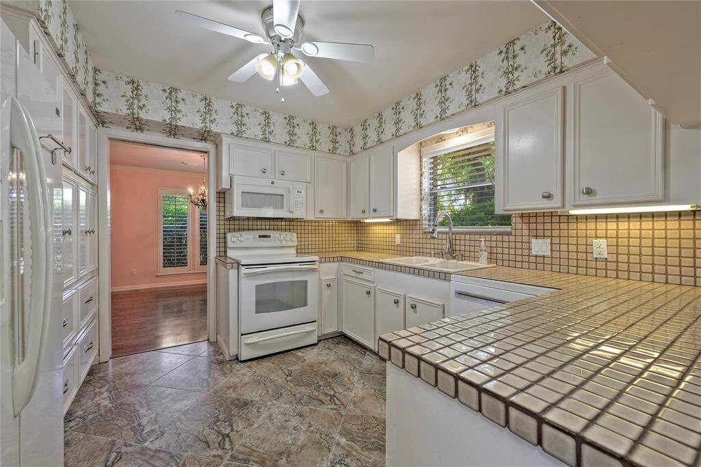 Refrigerator stays with home.