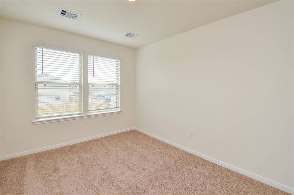 A view of the expansive Primary Bedroom Suite.