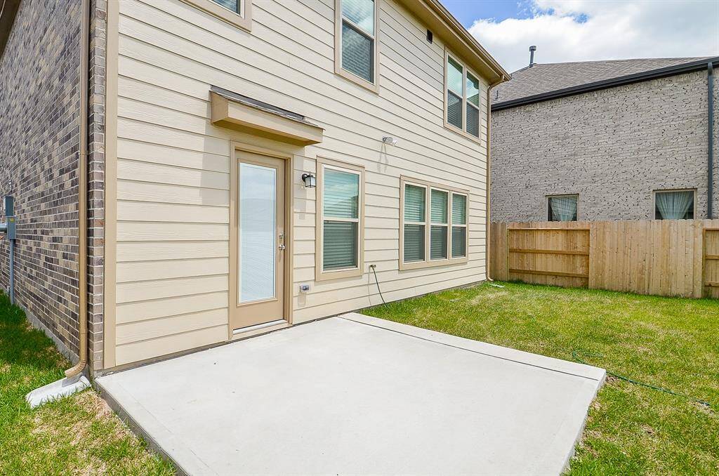 A view of the Rear of the home featuring the Patio.