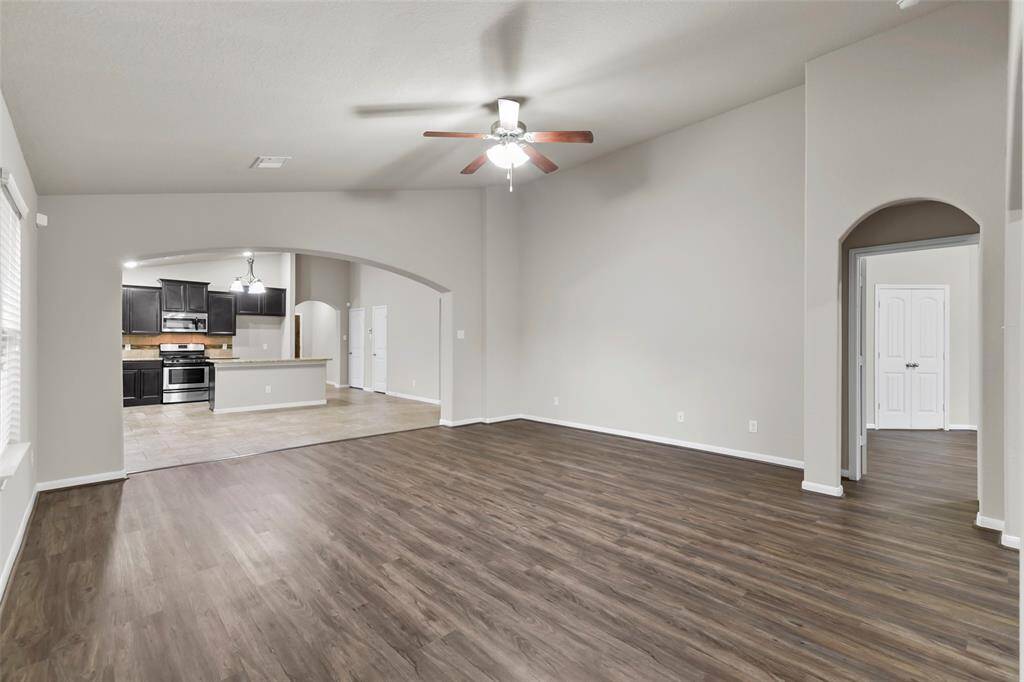 Open floor concept, view from family room towards the kitchen and breakfast area