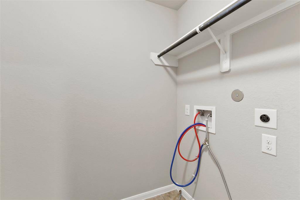 Utility room with gas and electric connections, inside