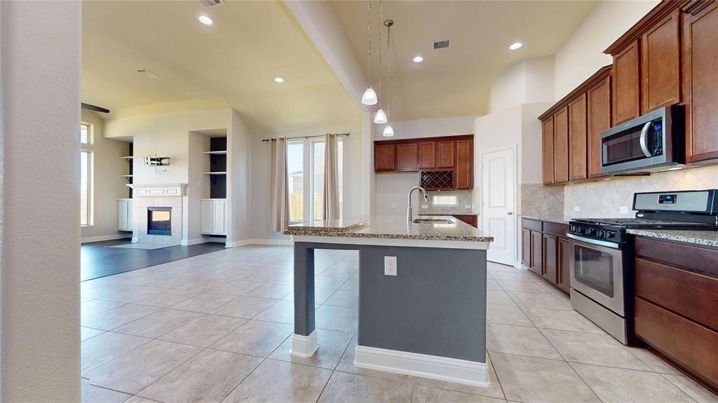 Another view of how the open concept featured in this beautiful home.