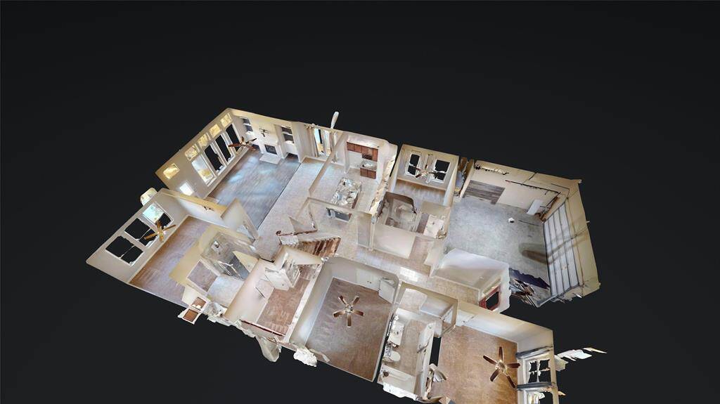 This is a 3D floor plan of a spacious home, featuring multiple rooms including a large living area, kitchen, and several bedrooms. The layout shows good natural light and a modern design.
