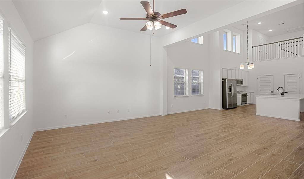 Open great room and dining area (*Photo not of actual home and used for illustration purposes only.)