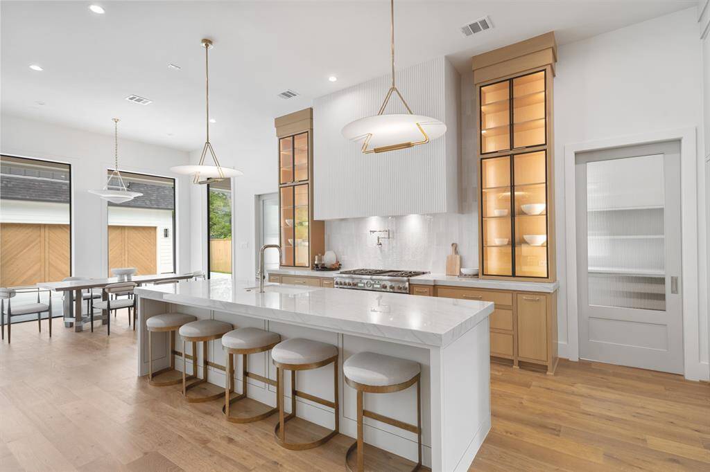 Intricately designed, this kitchen hosts all brand new Thermador appliances with thoughful details to make your culinary experiences a breeze.