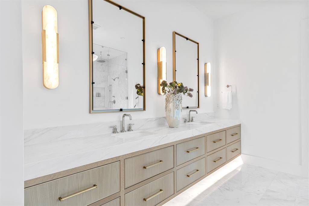Your custom designed, primary bathroom is warm and inviting and sure to make a stunning personal retreat.