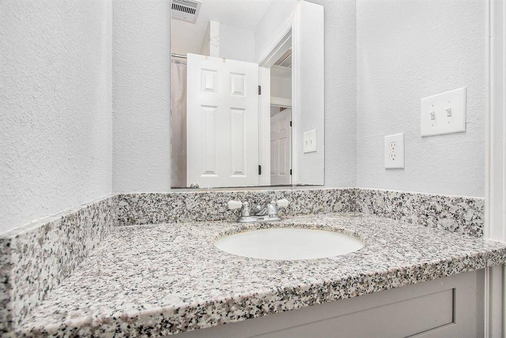 The hallway bathroom offers a shower/tub combo and convenient situated between the 2 secondary bedrooms.