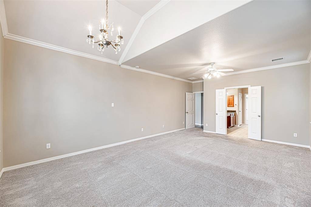 This area can be used as a sitting area or is perfect for a nursery. The ceilings are vaulted and has separate light fixture.