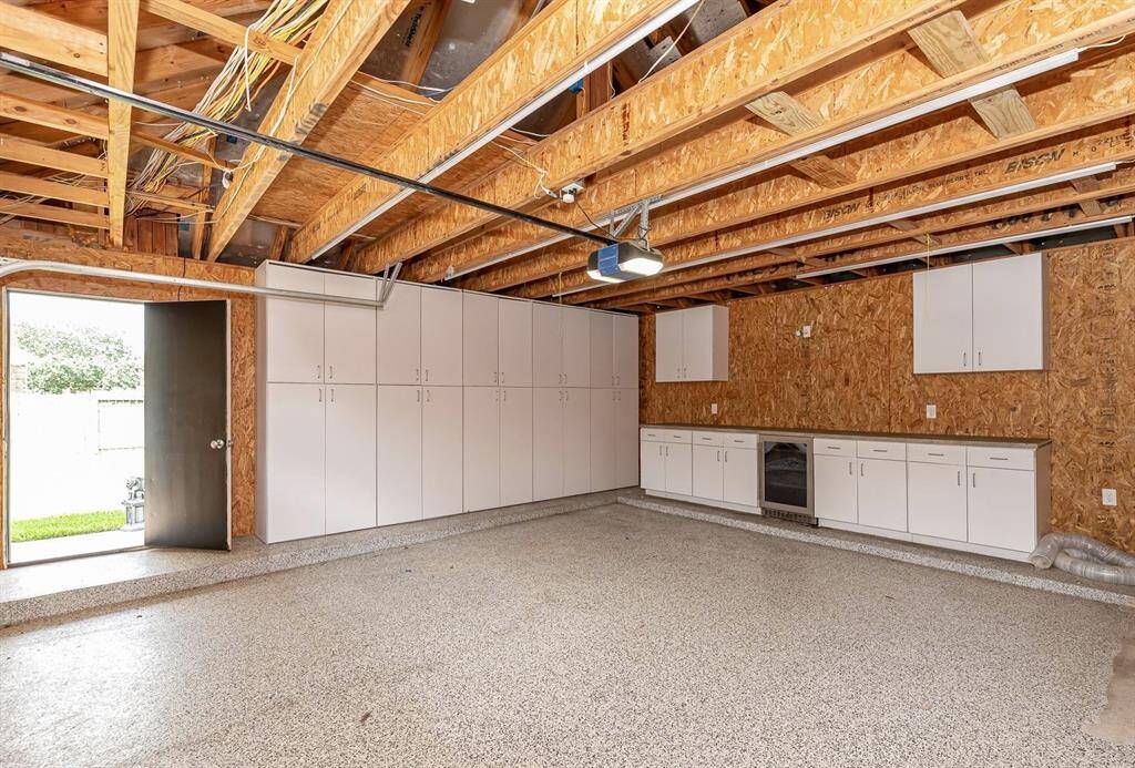 Garage also features a workbench area.