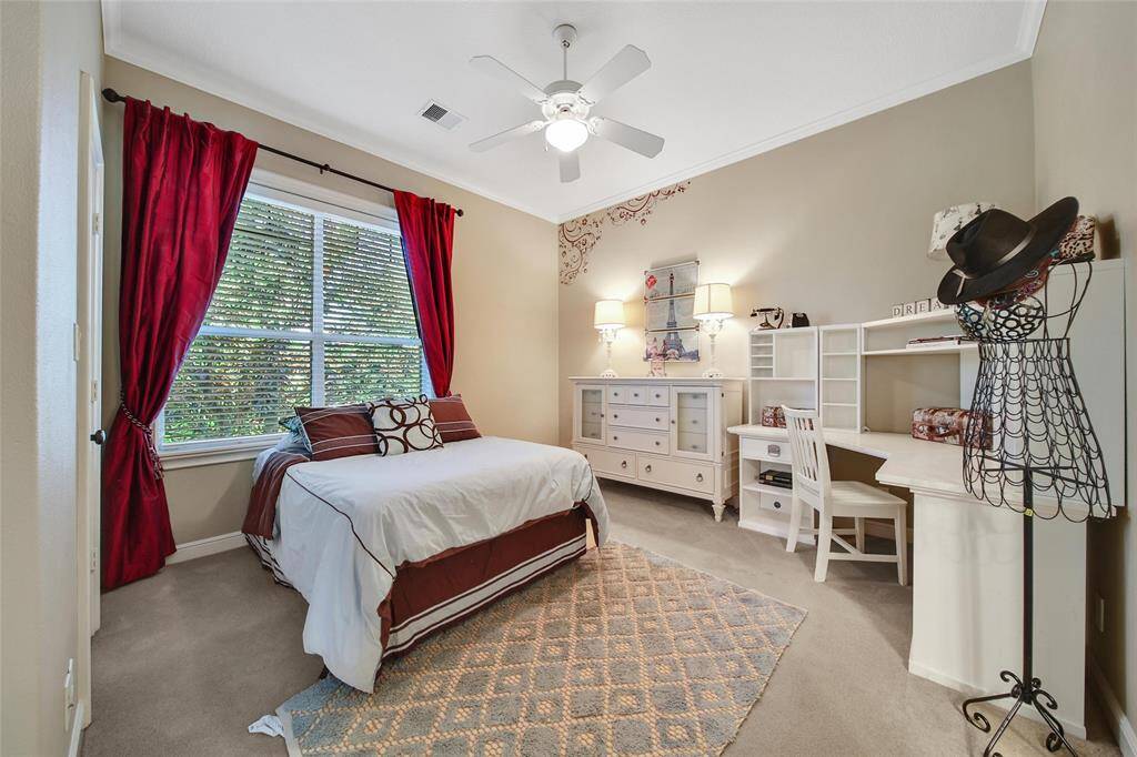 Secondary bedroom. All four bedrooms on the second floor are quite large. This bedroom has it's own sink/vanity and connects to the bedroom next door with a tub/shower combination bathroom.