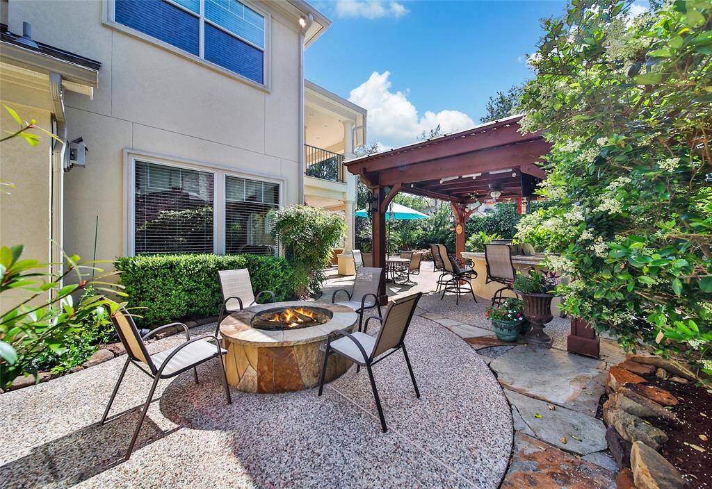 Excellent area to gather on cooler nights. There's also a second half bath over this way to keep people from tracking water into the house when using the pool.