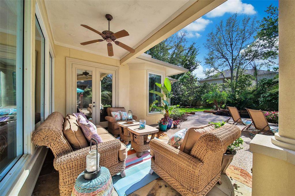 This covered patio is just off the breakfast room. Great space to enjoy the outdoors.