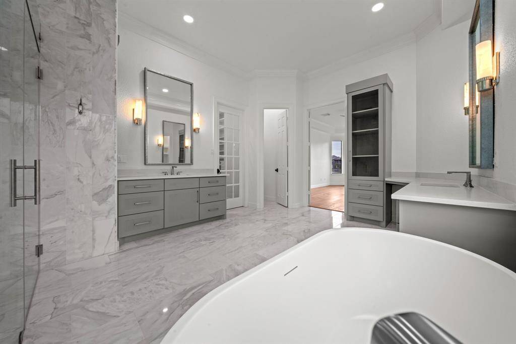 Separate vanities make this a truely custom space