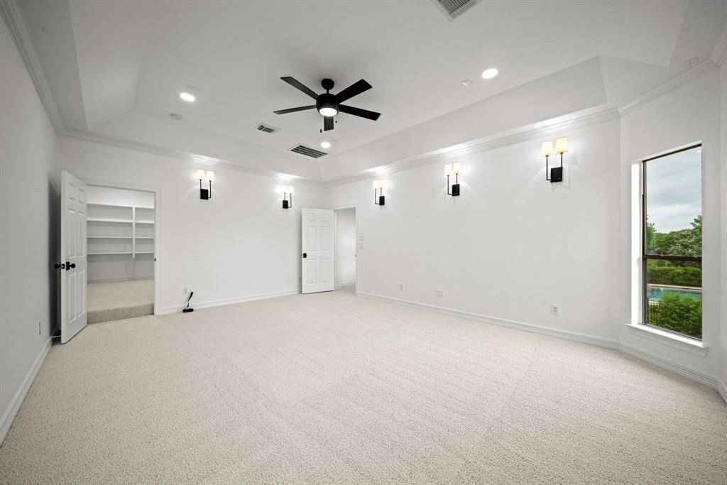 The large media room provides custom lighting and access from the gameroom