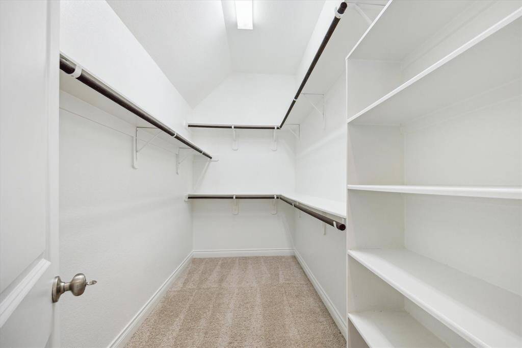 one of two walk-in closets in the primary.